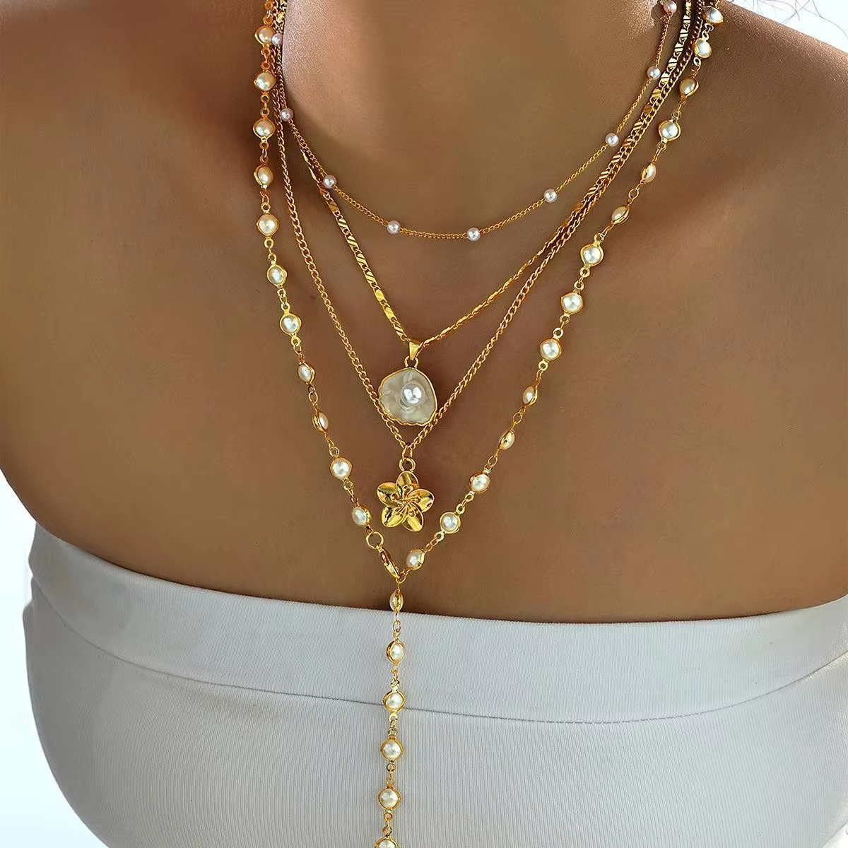 European and American Personalized New Flower Pendant Pearl Stacked Necklace Fashionable Retro French Long Sweater Chain